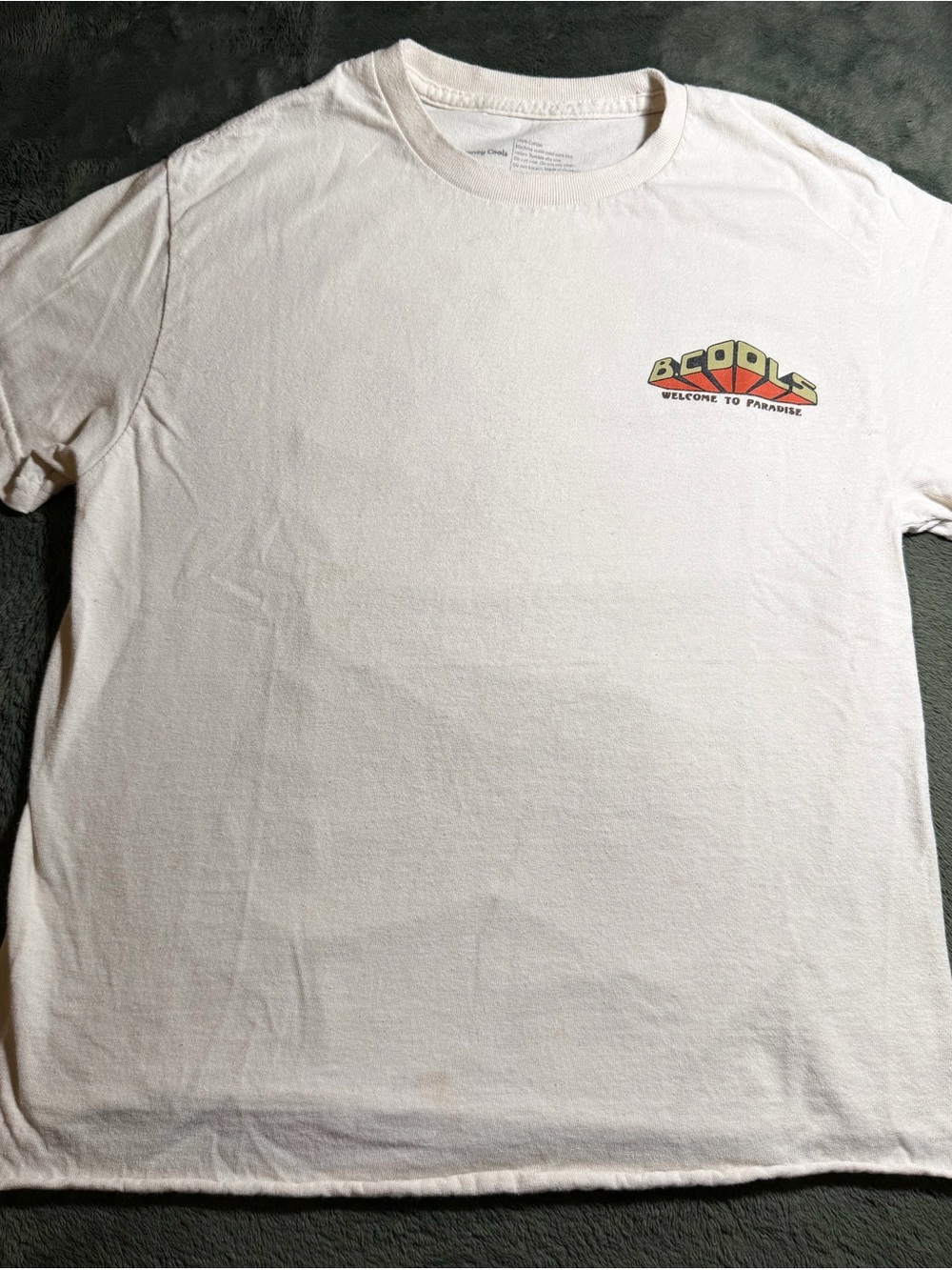 Barney Cools White Graphic Tee with Yellow & Orange Logo